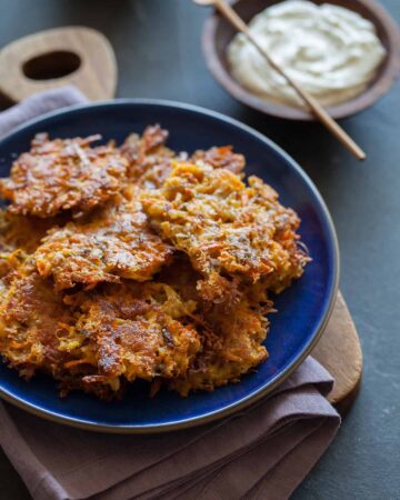 Root Vegetable Fritters served with sour cream.