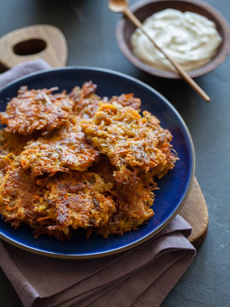 Root Vegetable Fritters served with sour cream.