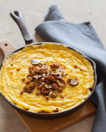 A recipe for Baked Polenta with mushrooms and sausage.