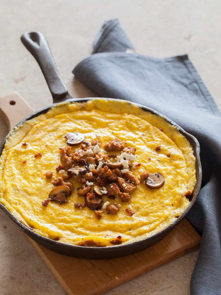 A recipe for Baked Polenta with mushrooms and sausage.