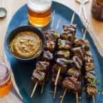 Beef Satay recipe with a peanut dipping sauce.