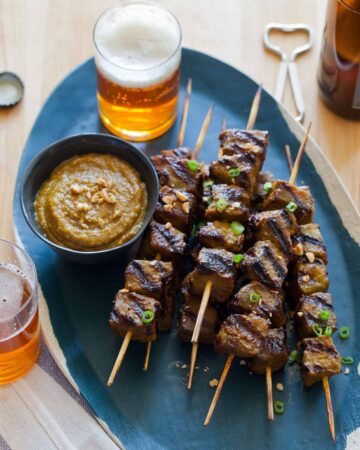 Beef Satay recipe with a peanut dipping sauce.