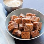 Banana Bread cut into cubes and fried, served with an ice cream dipping sauce.