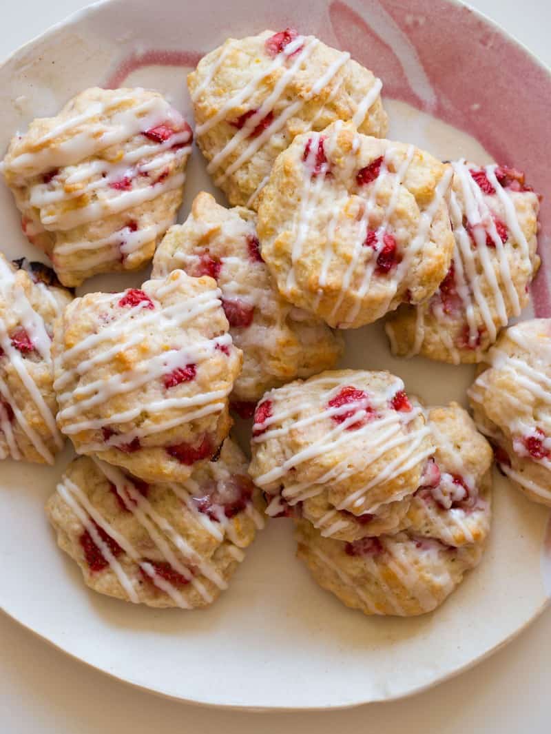 A close up of a pile of strawberry shortcake cookies.