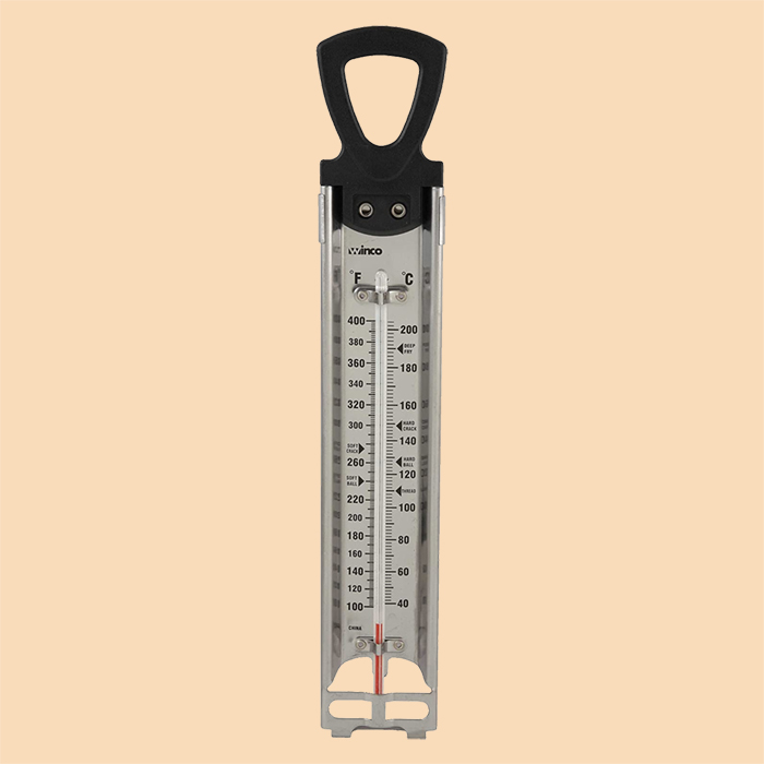 An image of a thermometer on a tan background.