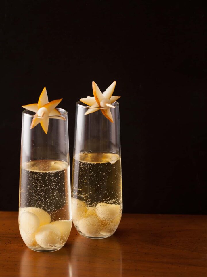 A recipe for Pear and Bubbles, a cocktail with pear puree and champagne.