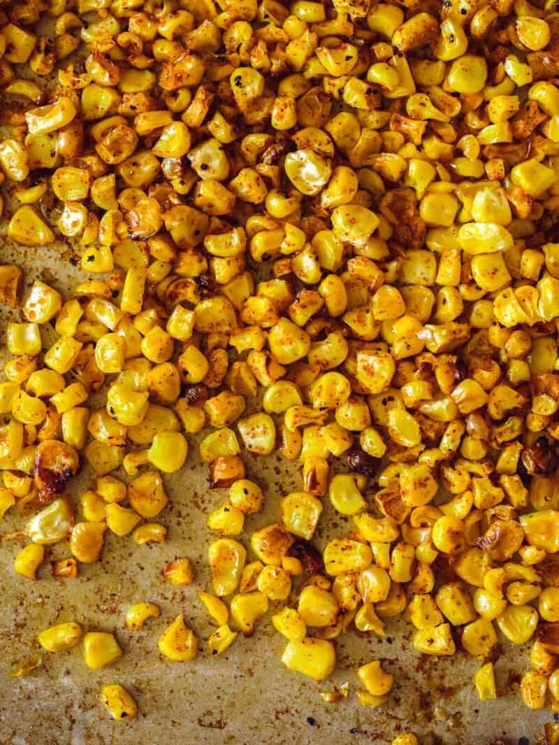 A close up of roasted corn for elote fritters.