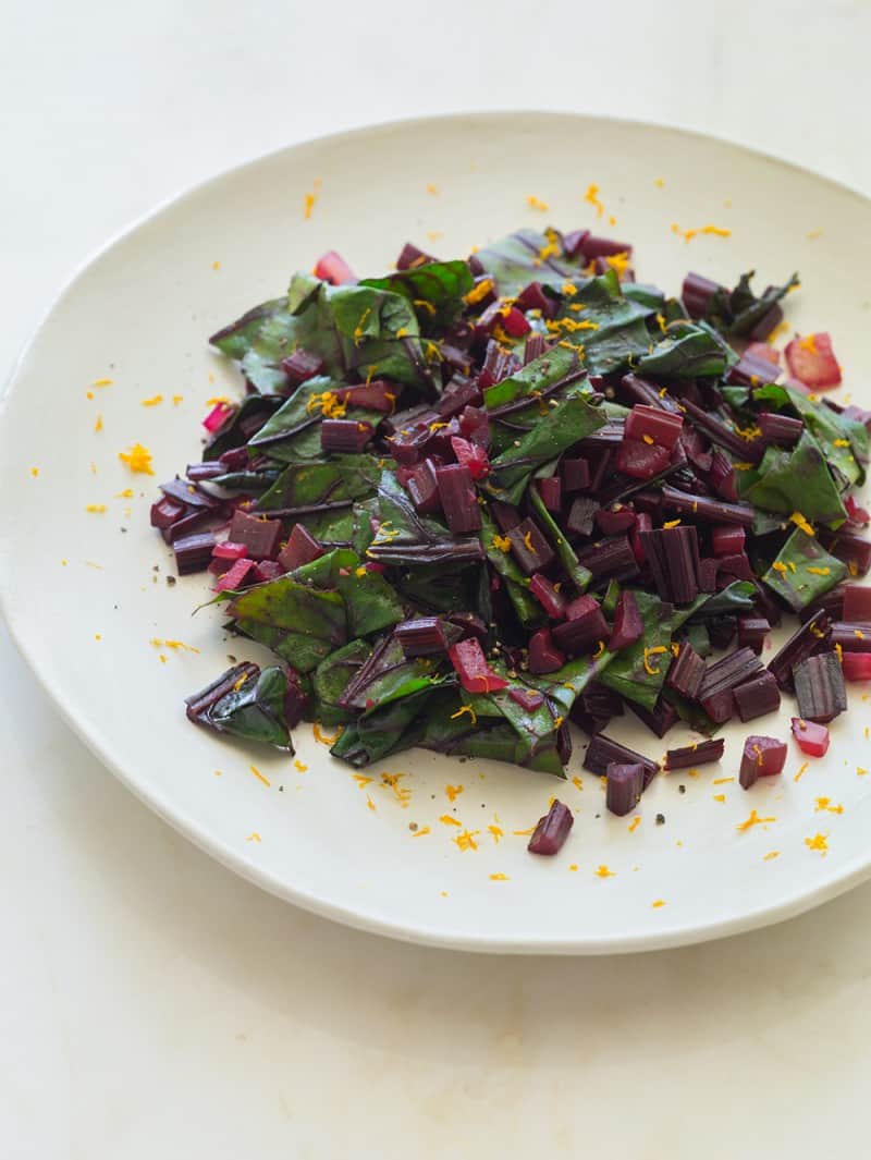 A plate of citrus sautéed beet stems.