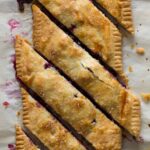 A bias cut blueberry slab pie.