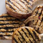 A close up of mustard crusted pork chops.