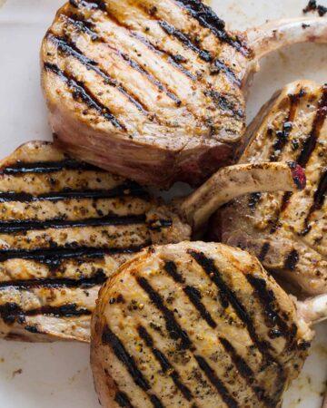 A close up of mustard crusted pork chops.