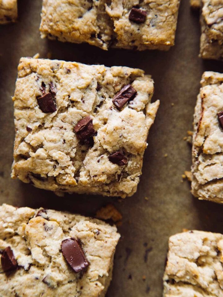 A close up of chocolate chunk and cinnamon scones.