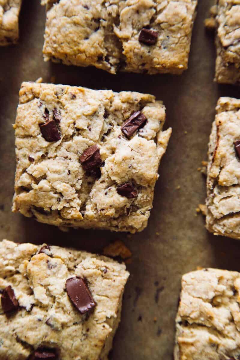 A close up of chocolate chunk and cinnamon scones.