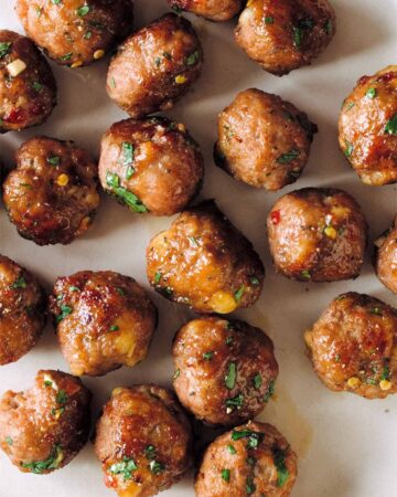 A close up of ginger garlic cocktail meatballs.