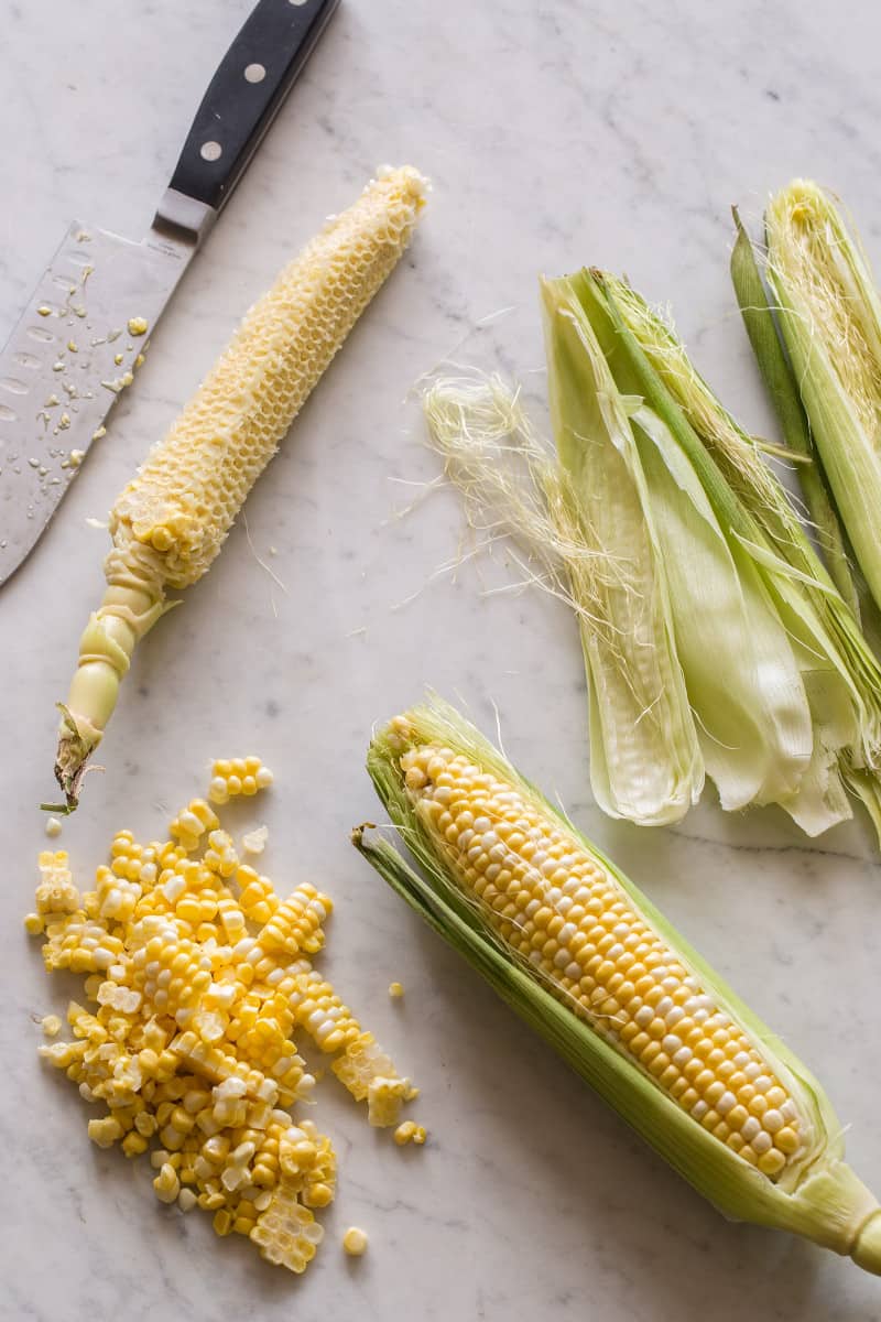 Corn on the cob, out of the husk, and cut off the cob.