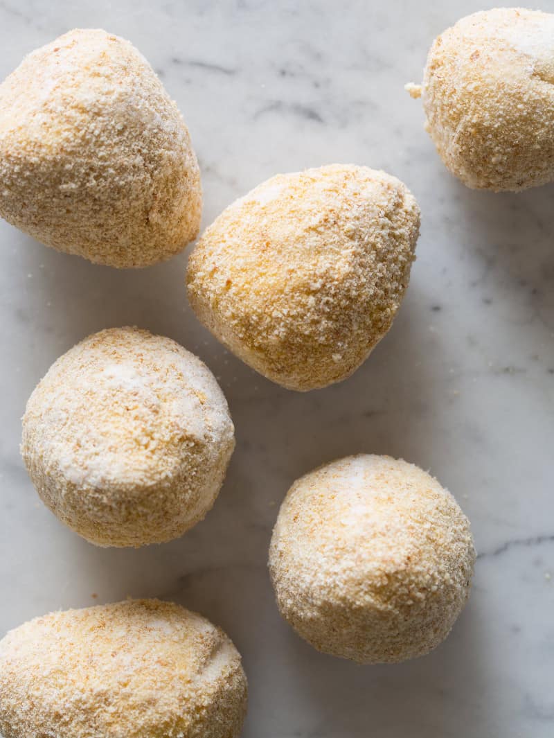 A close up of coxinha prepped and ready to be fried.