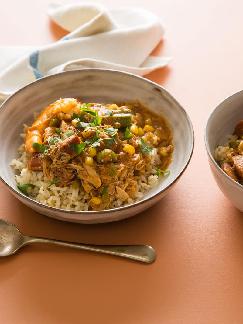Chicken and Andouille Gumbo in two bowls with a napkin.
