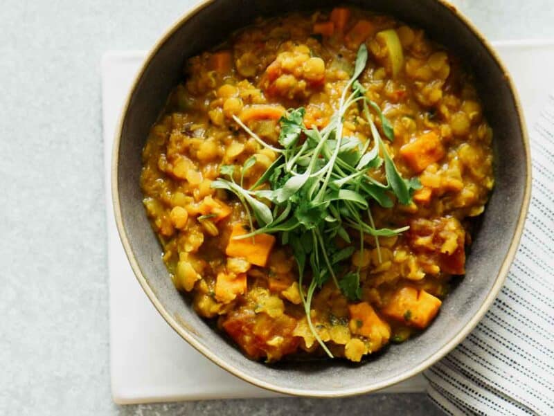 Stewed red lentils, or masoor dal reicpe in a bowl. 
