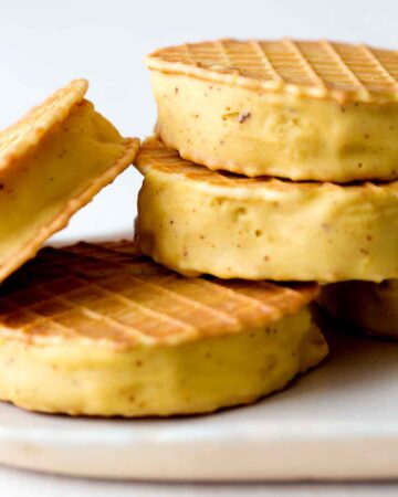 Browned Butter Ice Cream Sandwiches stacked on a platter.