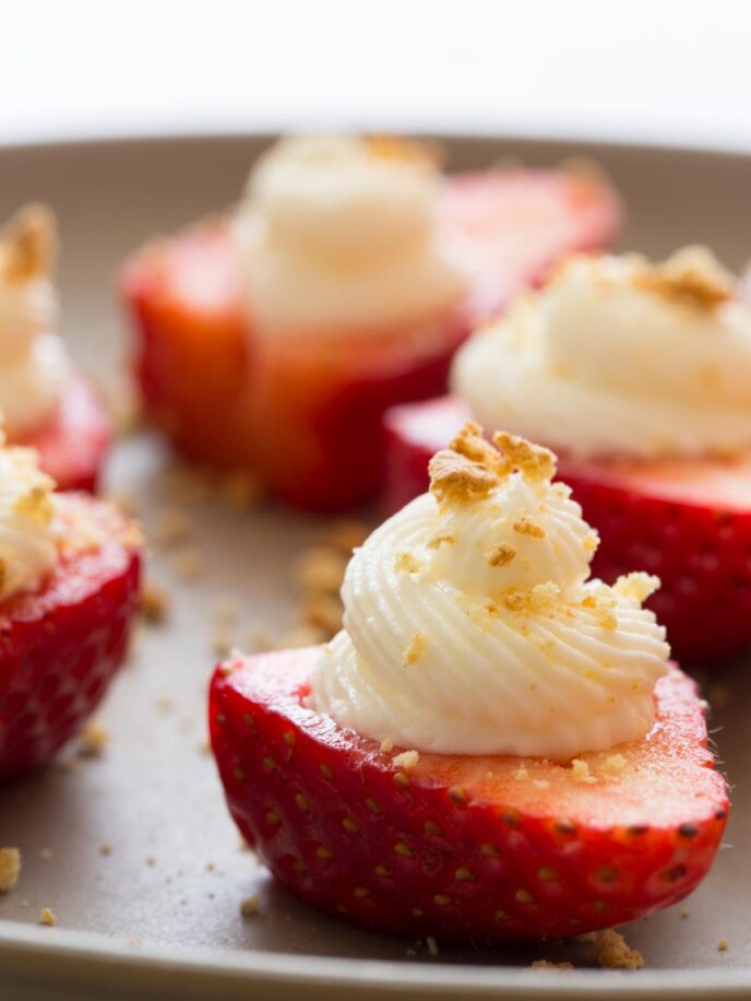 Close up on strawberry deviled heats on a platter.