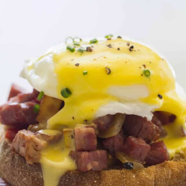 Corned Beef Hash Eggs Benedict Breakfast recipe Spoon Fork Bacon