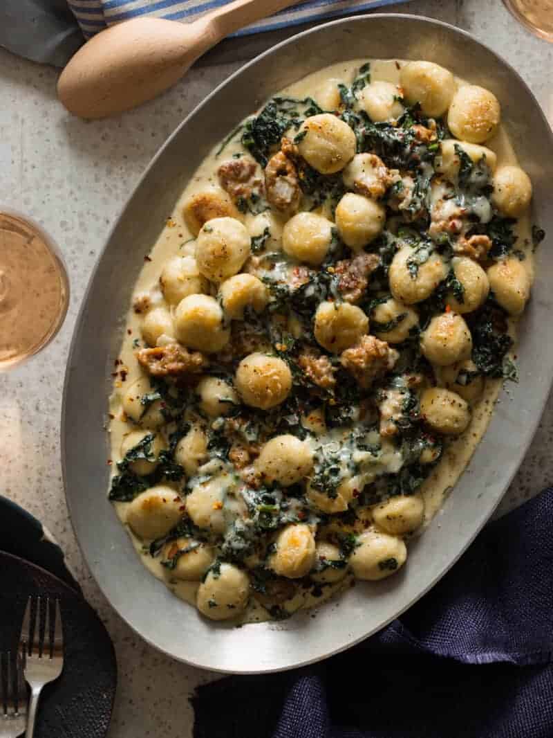 A plate of sausage and kale baked gnocchi.