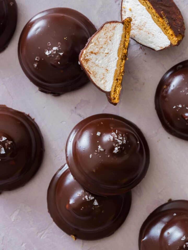 Salted gingersnap mallomars with one cut in half.