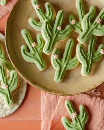 Cactus cookies on a plate.