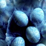 Shibori style easter eggs on paper towels.