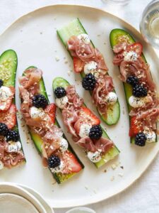 A plate of prosciutto cucumber crostini.