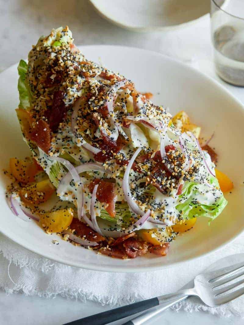 An everything bagel seasoning wedge salad in a bowl.