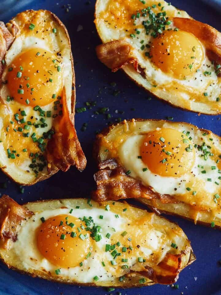 A close up of twice baked breakfast potatoes.