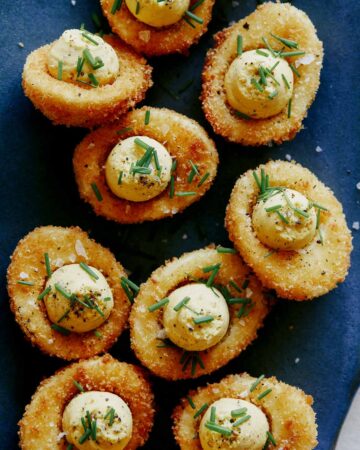A close up of fried deviled eggs, a new years eve finger food recipe.