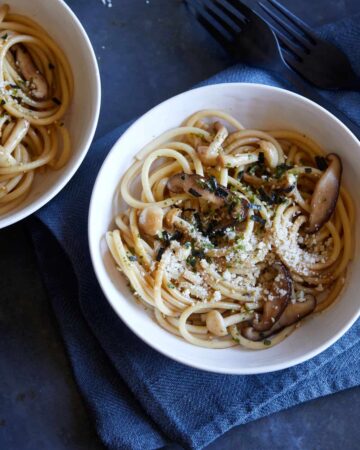 Bowls of wild mushroom wafu pasta with soy butter sauce.