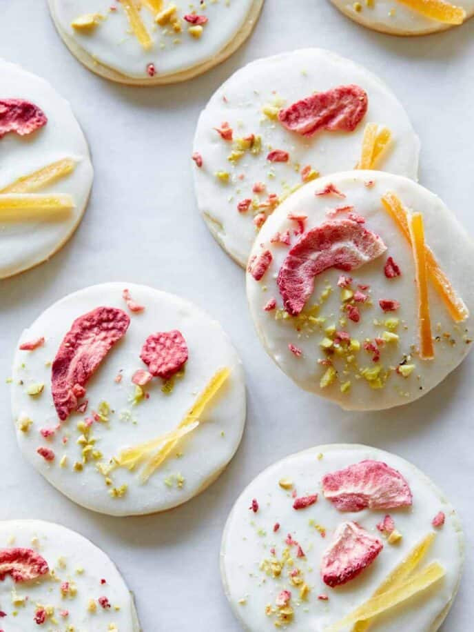 A close up of white chocolate dipped butter cookies.