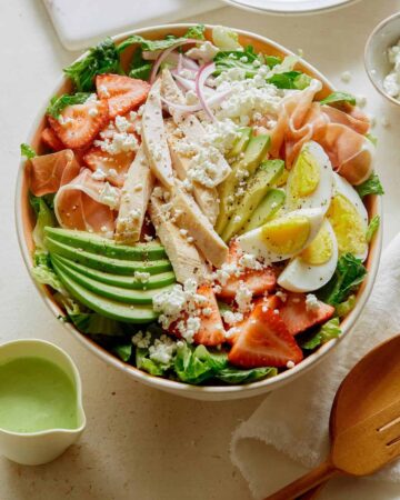 Strawberry cobb salad with dressing on the side.