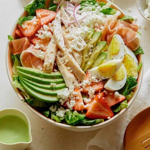 Strawberry cobb salad with dressing on the side.