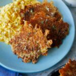 A plate of crispy cheese hash browns.