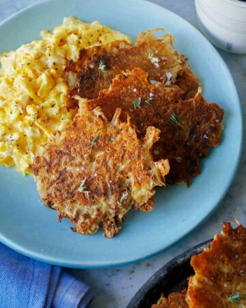 A plate of crispy cheese hash browns.