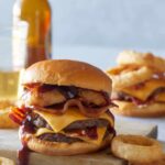 Bacon western double cheeseburgers with onion rings.