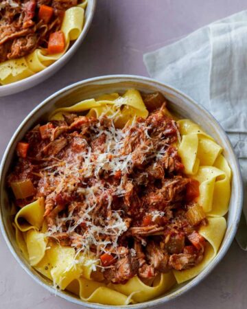 Bowls of braised pork ragu pappardelle.
