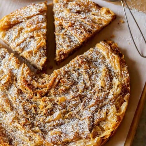 A sliced chai spiced ruffled milk pie.