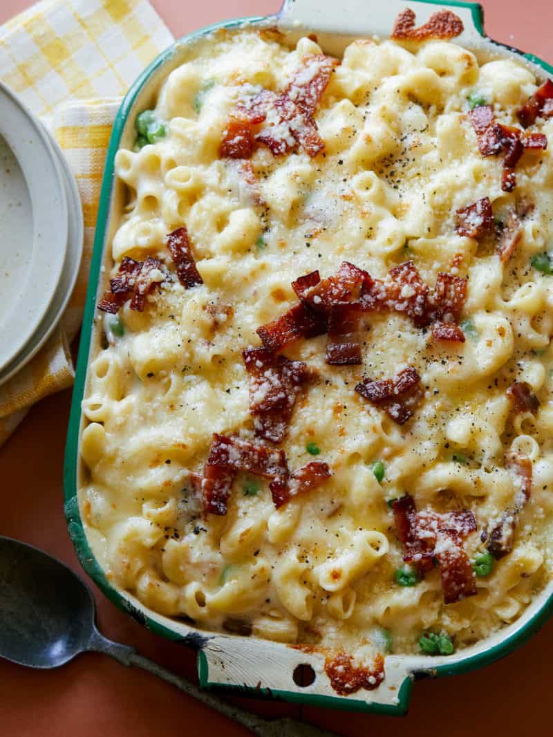 Creamy Baked Carbonara Mac and Cheese in a baking dish. 