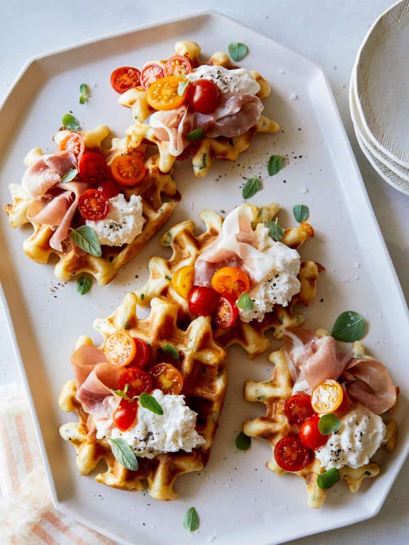 A Savory waffle recipe topped with prosciutto and burrata. 