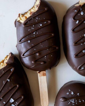 A close up of crunchy peanut butter pie pops.