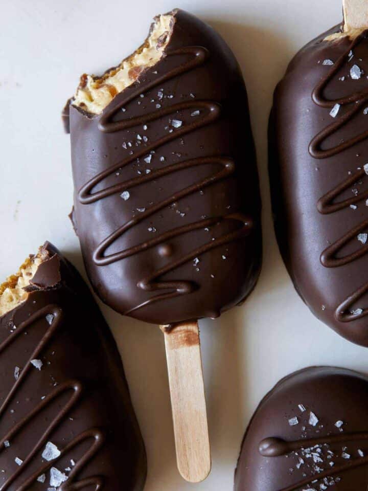 A close up of crunchy peanut butter pie pops.