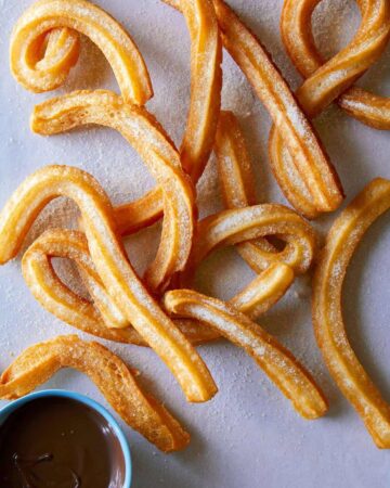 Churros with chocolate dipping sauce.