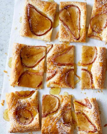 Sliced caramelized pear tart.