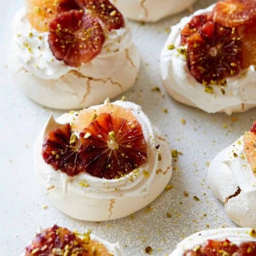 Mini pavlovas with citrus on top.