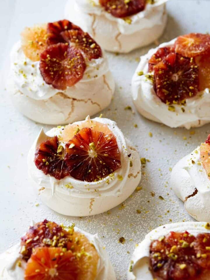 Mini pavlovas with citrus on top.